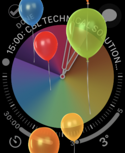 An Apple Watch face with balloons 
